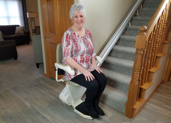 woman using stair lift