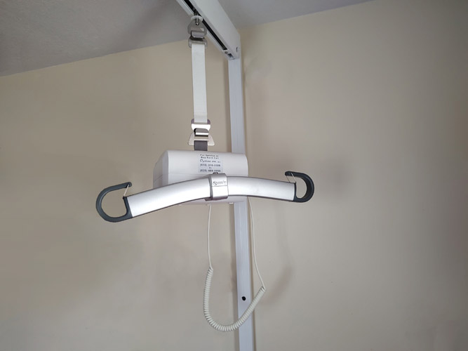 Pole mounted patient lift track