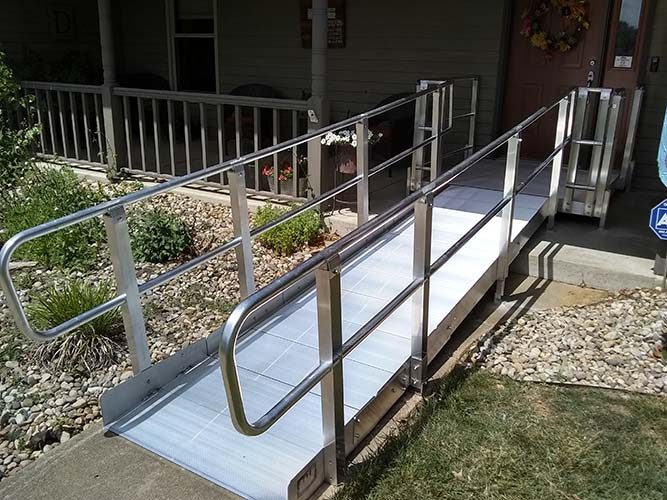 Wheelchair-ramp-leading-to-front-door-of-home Wheelchair ramp leading to the front door of home